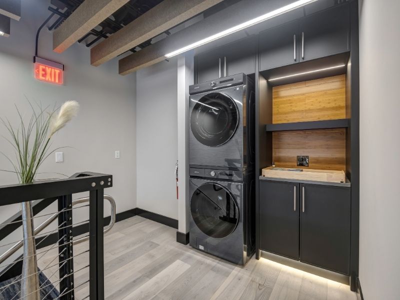 Contemporary Commercial Laundry Storage with Black Shelves Contemporary Commercial Laundry Storage with Black Shelves