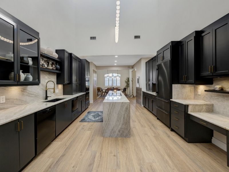 Elegant Black Kitchen with Marble Island Elegant Black Kitchen with Marble Island