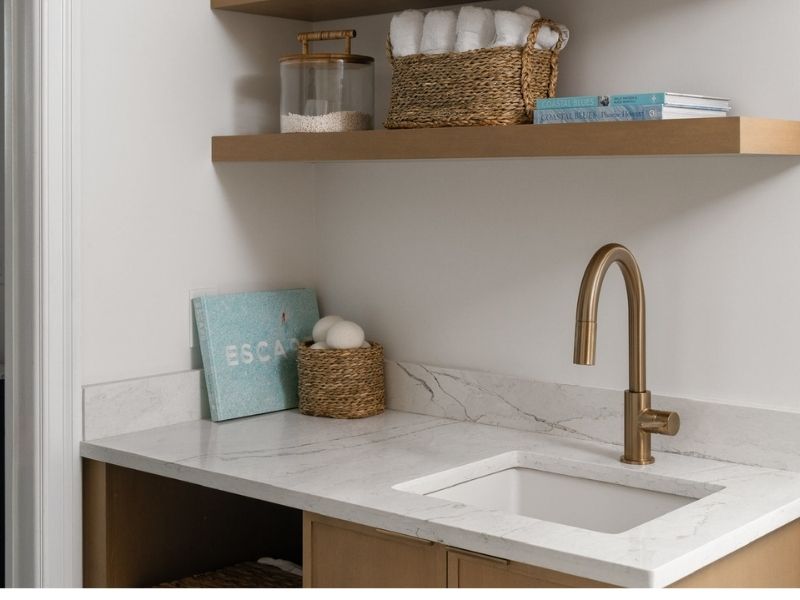 Laundry sink with a white countertops Laundry sink with a white countertop