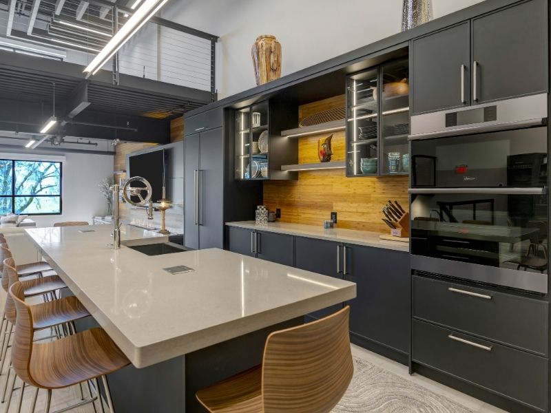 Modern Black Kitchen with Brown Stools Modern Black Kitchen with Brown Stools
